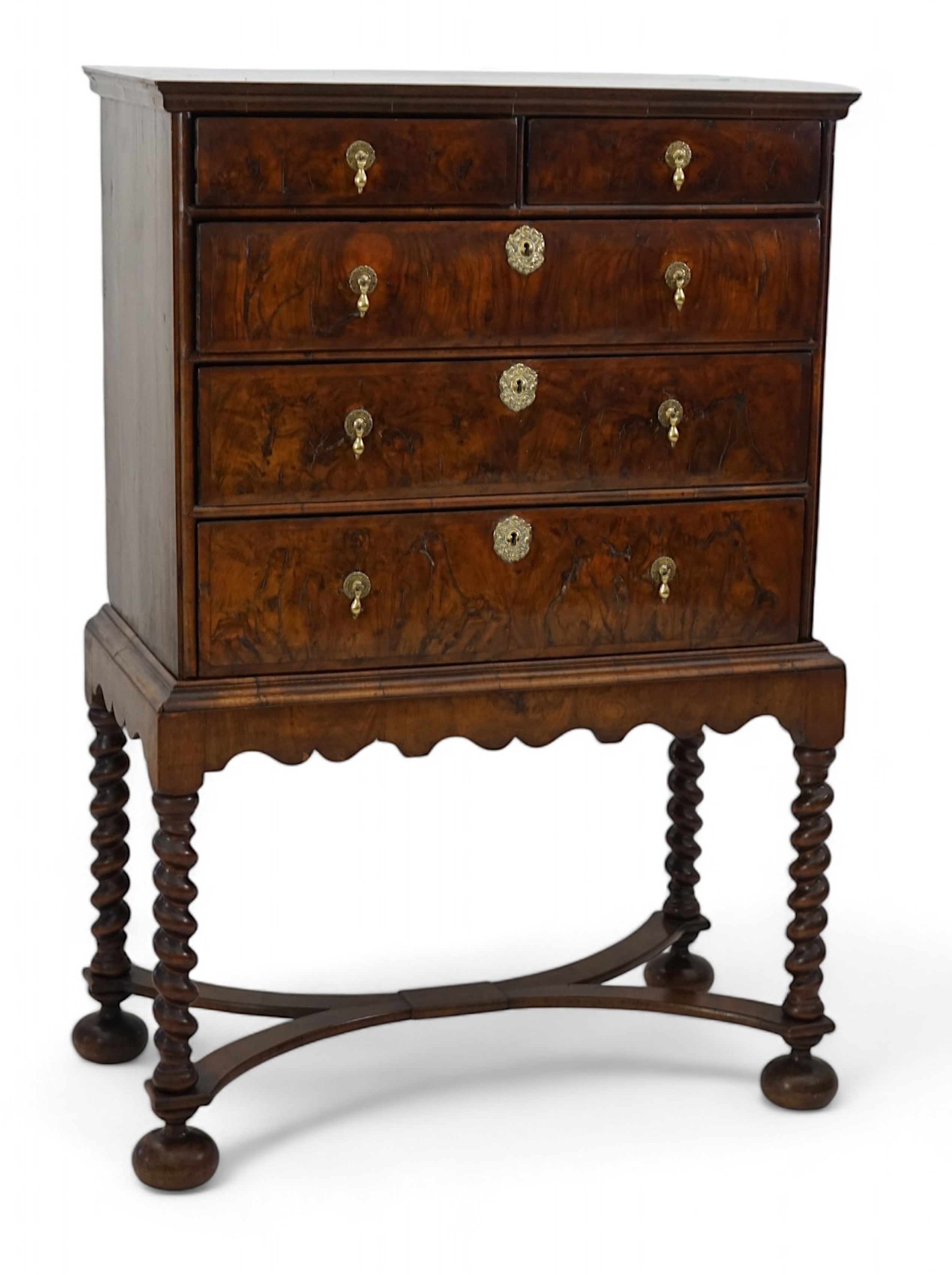 An early 18th century and later crossbanded walnut chest on stand